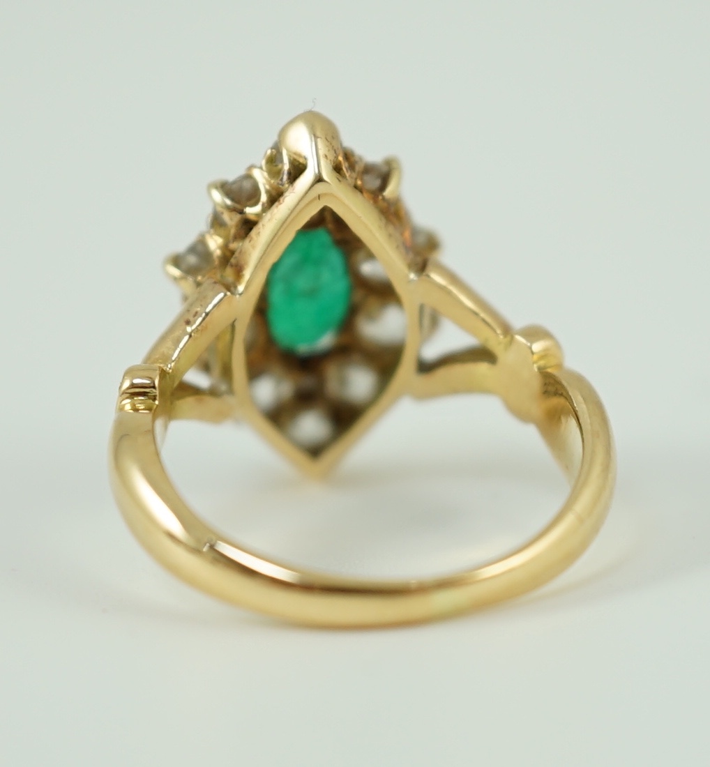 A Victorian style gold, emerald and diamond set marquise cluster shaped ring